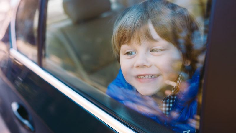 A child in the back seat